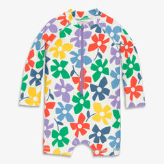 Baby one-piece rash guard in rainbow blooms