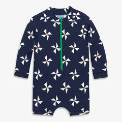 Clearance baby one-piece rash guard in rainbow pinwheels