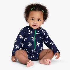 Clearance baby one-piece rash guard in rainbow pinwheels