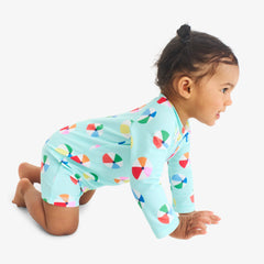 Baby one-piece rash guard in beach balls