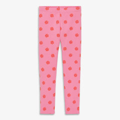 Kids legging in dandelions